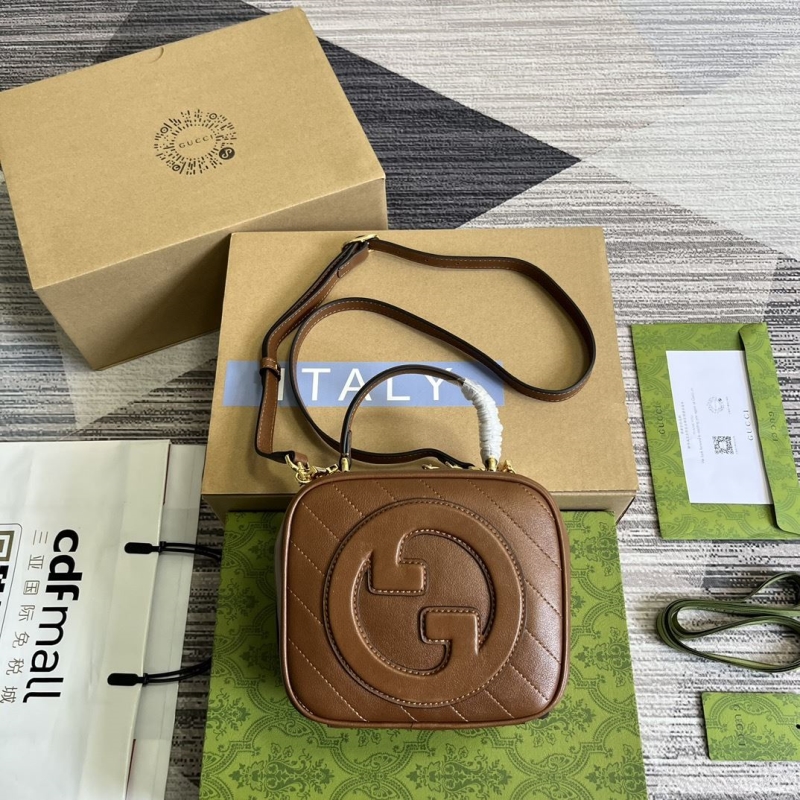 G*u*i top handle bags